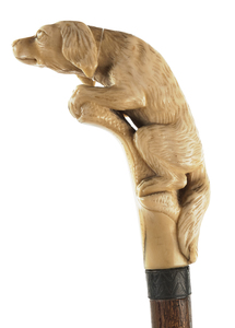 Cane with dog handle